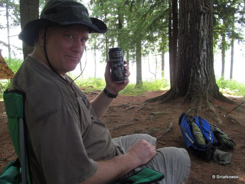 Enjoying a beer in camp