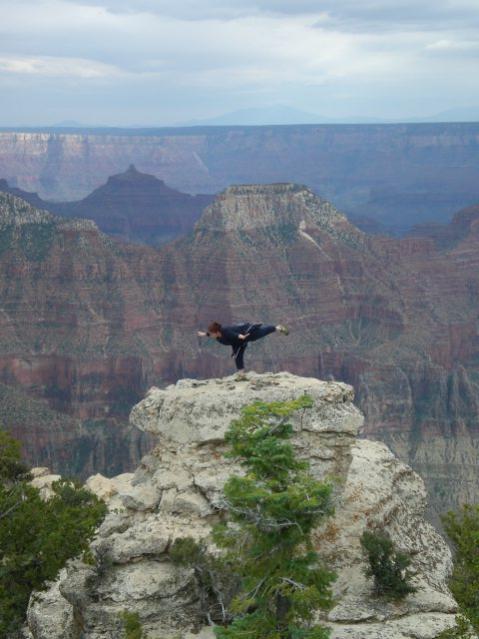 yoga pose on a cliff along the Bright Angel Trail in the North Rim close to the Grand Canyon Lodge