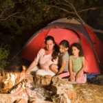 camping mother and daughters